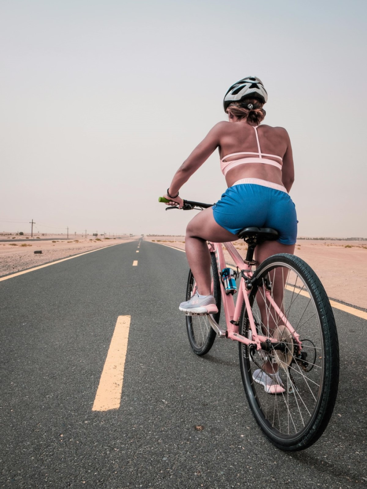 Lady on a bicycle.